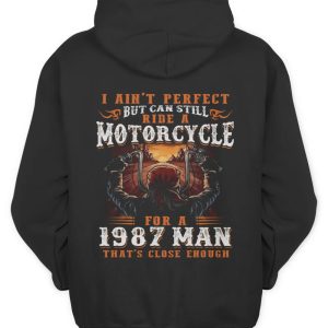 1987 Man Riding Motorcycle Hoodie – Vintage Sunset Graphic for Bikers