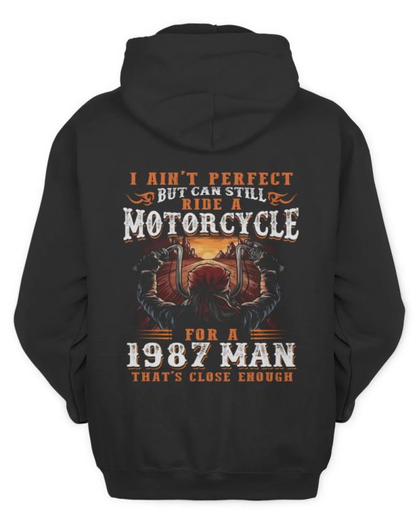 1987 Man Riding Motorcycle Hoodie – Vintage Sunset Graphic for Bikers